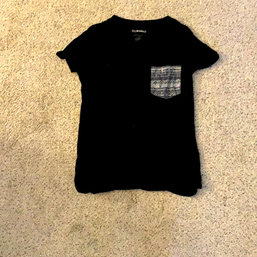 Large stylized frocket tee